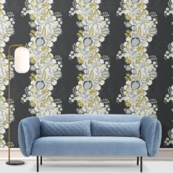 Pomegranate Wallpaper • Charcoal • Insitu with blue sofa