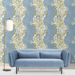 Pomegranate Wallpaper • French Blue • Insitu with blue sofa